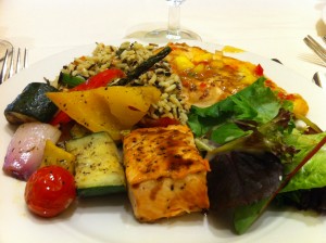 chicken, salmon, rice and fresh vegetables.